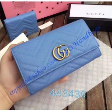 Gucci GG Marmont continental wallet in Blue leather with a chevron design